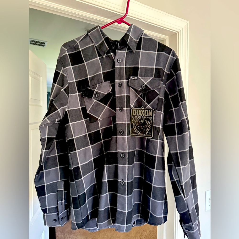 Dixxon “The Darkhorse”. Size M. Worn, but good condition. Includes tag.